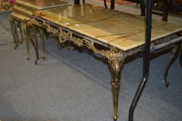 An onyx and brass rectangular coffee table.