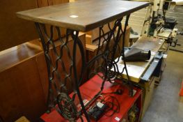 A treadle sewing machine table.