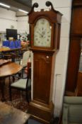 A 19th century oak longcase clock with eight day movement, painted arched dial signed Thomas