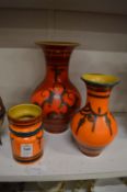 Three Dutch Gouda porcelain vases.