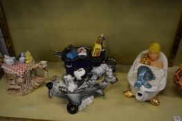 A collection of novelty teapots.