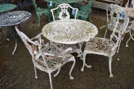 White painted aluminium patio table and three chairs.