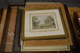 A small collection of paintings and prints.