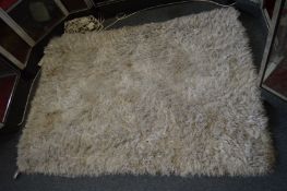 A contemporary rug, 175cm x 125cm.