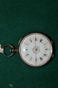 A ladies silver cased pocket watch with decorative enamel dial.