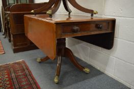 A 19th century mahogany pedestal Pembroke table.