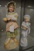 Two Continental bisque porcelain figures.