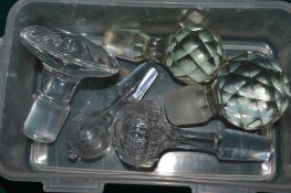 Glass decanter stoppers.