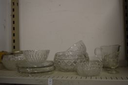 A shelf of glassware.