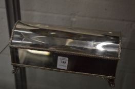 A plated desk stand.