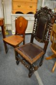 An oak high back dining chair and a 19th century mahogany hall chair with shield shaped back.