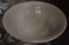 A Chinese celadon bowl.