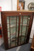 A 19th century mahogany two door corner cabinet.