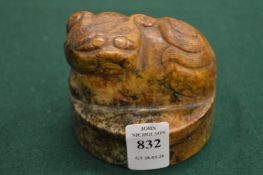 A large Chinese soapstone seal, possibly 19th century in the form of a lion dog.