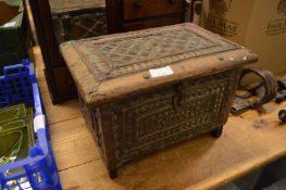 An Eastern metal bound casket.