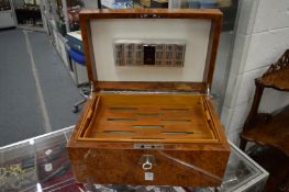 A good burr wood humidor.
