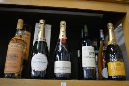 A bottle of Glenmorangie malt whisky and other wines and spirits.