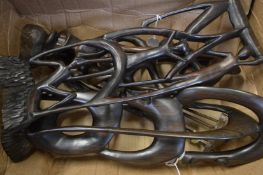 Carved wood African figure groups.