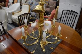 An ormolu six branch chandelier.