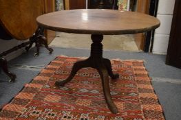 A 19th century mahogany tilt-top tripod table (reduced in height).