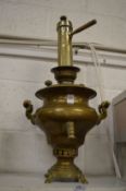 A brass samovar.
