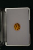 A 7.5ct oval natural golden citrine.