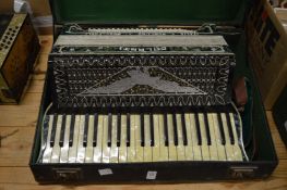 A Calanti piano accordion with original case.