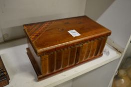 An Italian olive wood box.