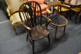 A wheel back armchair and a bentwood chair.