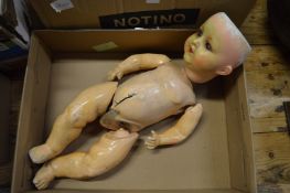 An Amand Marseille porcelain headed doll (af).