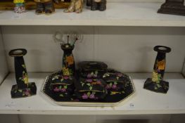 A porcelain dressing table set.