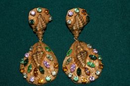 A good large pair of decorative shell shaped ear clips mounted with coloured stones.