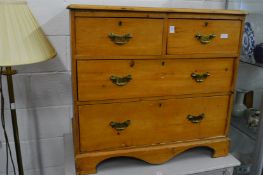 19th century small pine chest of two short and two long drawers.