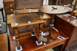 An oak occasional table and a tripod table.