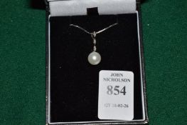 A diamond and pearl pendant and chain.