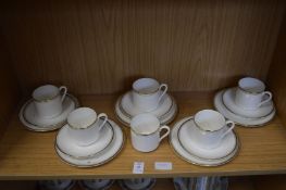 A set of six Royal Doulton Gold Concord trios.