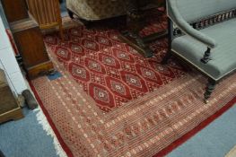 A large hand knotted Bukhara carpet, 370cm x 270cm.