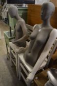 Two mannequin torso's.