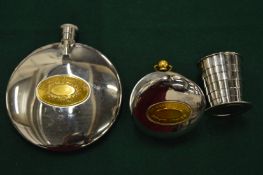 A Dalvey chrome plated and brass circular hip flask together with a matching travelling cup.