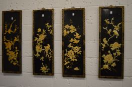 A set of four Chinese lacquer panels.