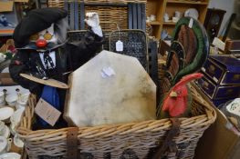 Large wicker basket containing fire guard, decorative carved wood and painted rooster, musical