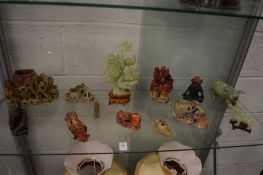 Quantity of soapstone and other Chinese carvings.