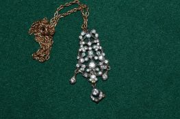 Decorative pendant and chain.