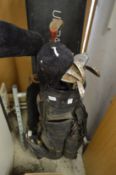 A bag of old golf clubs.