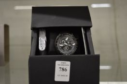 An Omega Swatch Mission to the Moon phase watch.