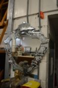 A Venetian style decorative wall mirror (af).