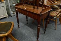 A Victorian two drawer side table.