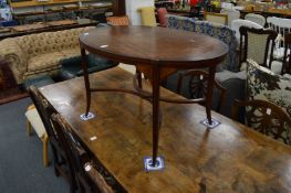 An inlaid satinwood oval occasional table (formerly and etagere).