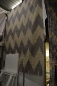 Modern woollen rug with zigzag design, 227cm x 175cm.