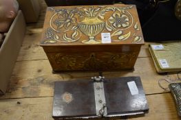 Stationery casket and a tie press.